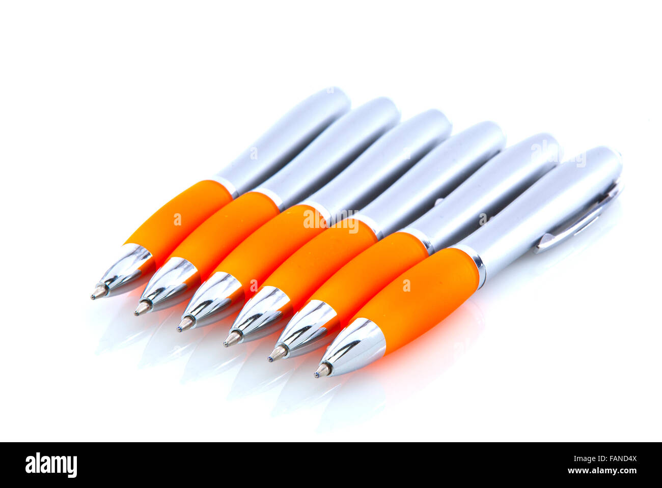 Orange et argent stylos isolated on white Banque D'Images
