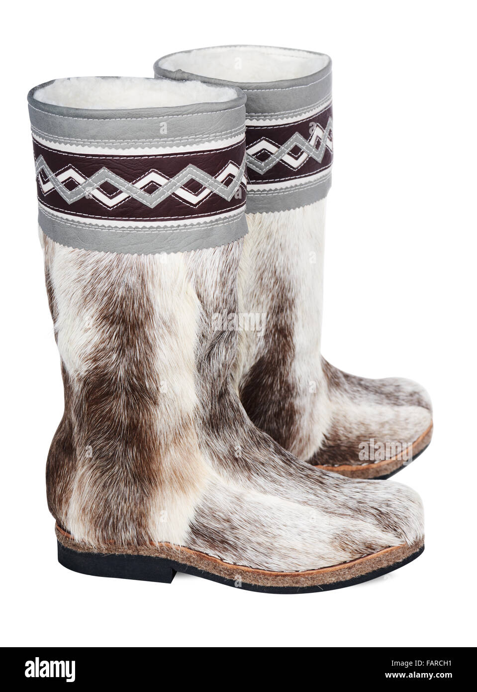 Chaussures Bottes fourrure haut - peuples du nord national de skinning deer. Isolé sur fond blanc Banque D'Images