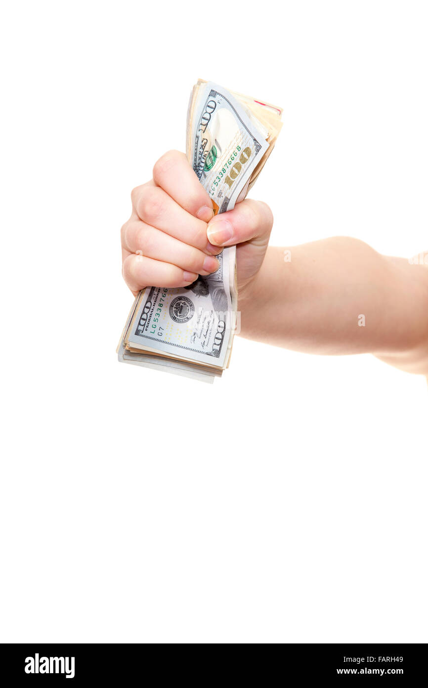 Hand holding pile of us dollar notes. Le tout sur fond blanc. Banque D'Images