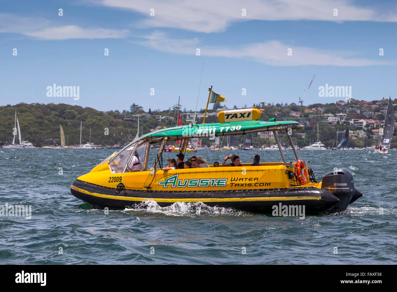 Taxi de l'eau de la Rolex Sydney Hobart Yacht Race 2015, le port de Sydney, l'Australie, Samedi, Décembre 26, 2015. Banque D'Images