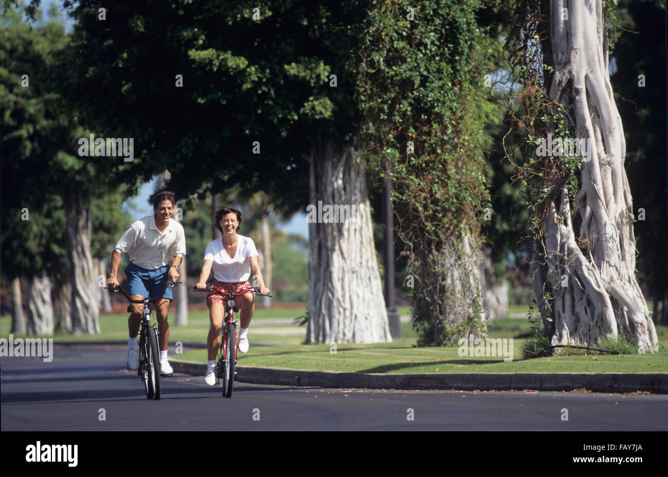 Big Island, Hawaii, couple walking at Mauna Lani Resort Banque D'Images