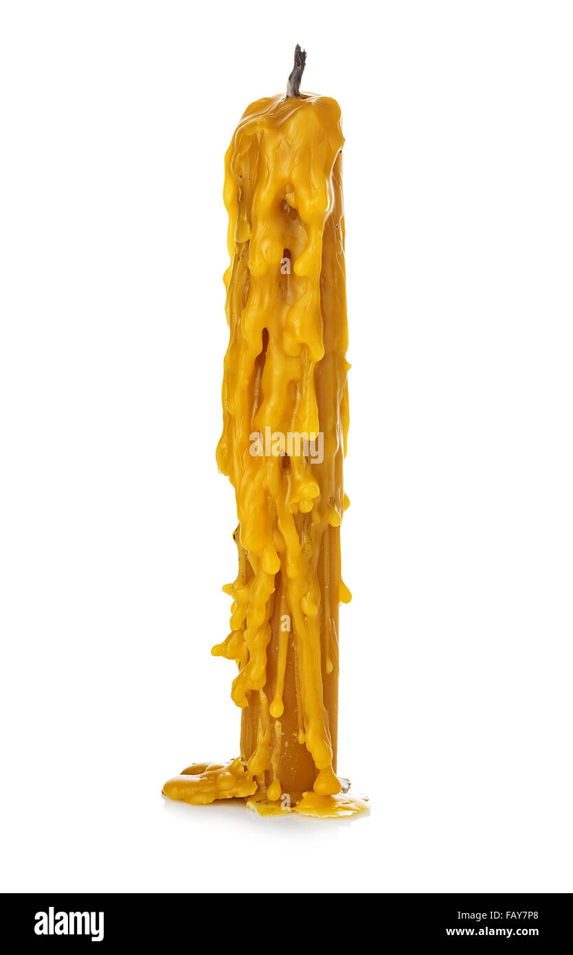 Old vintage brûlé l'église de la cire de bougie close-up isolé sur un fond blanc. Banque D'Images