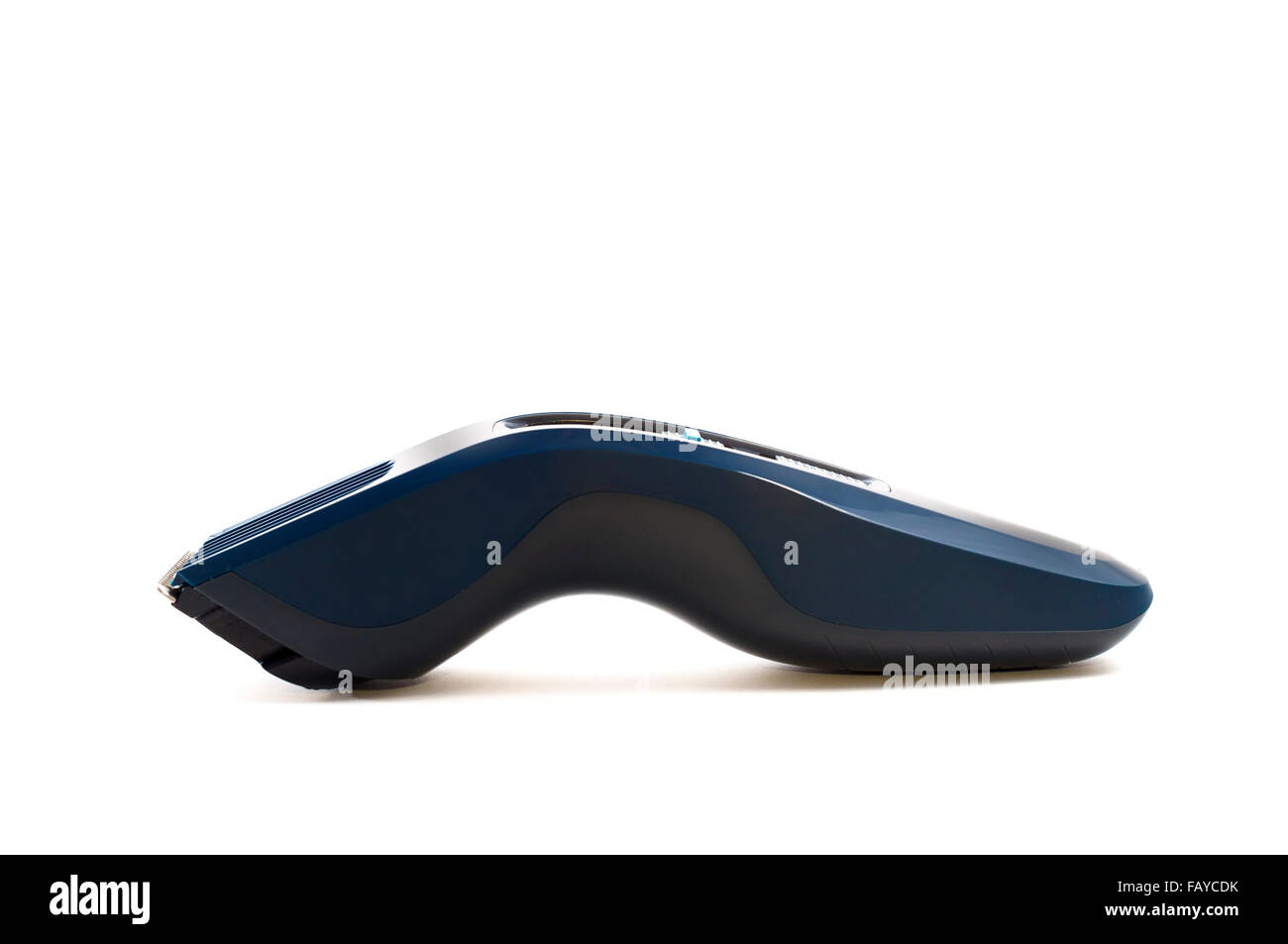 Machine sans fil pour une coupe sur un fond blanc Banque D'Images