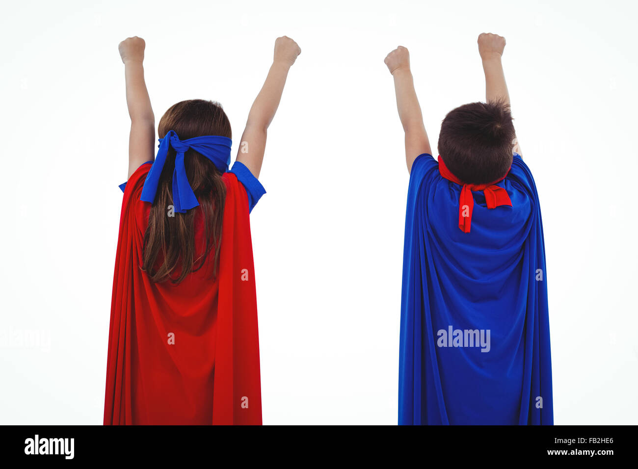 Les enfants masqués se faisant passer pour des super-héros Banque D'Images