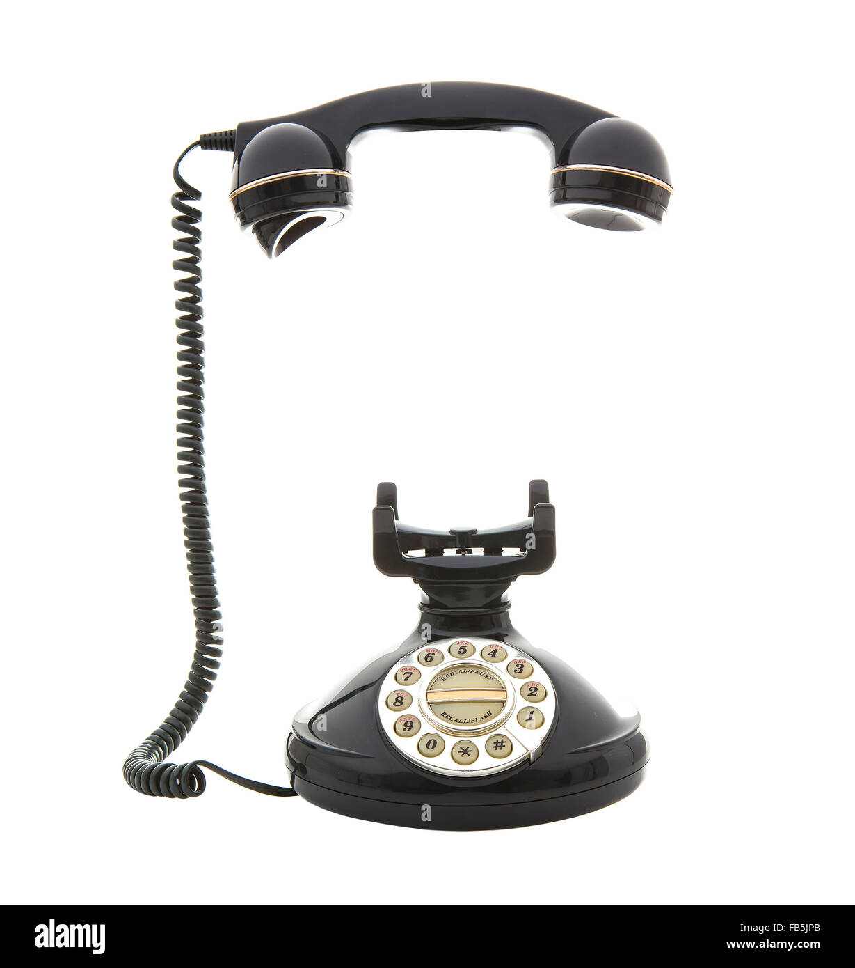 Style ancien téléphone sur un fond blanc Banque D'Images
