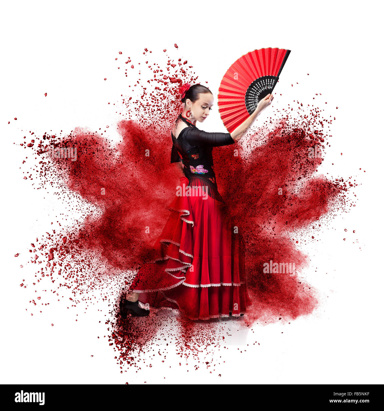 Jeune femme danser le flamenco contre explosion isolated on white Banque D'Images