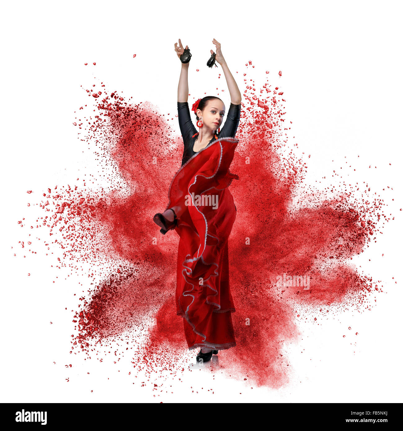 Jeune femme danser le flamenco avec les castagnettes contre explosion isolated on white Banque D'Images