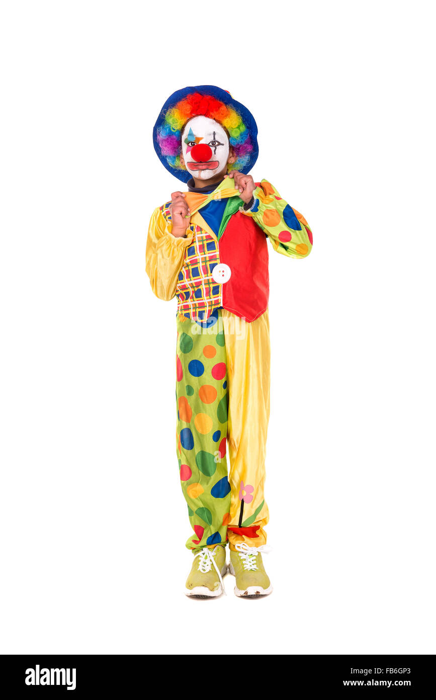 Jeune fille avec costume clown isolé dans White Banque D'Images