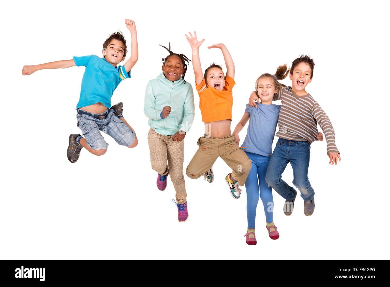 Groupe d'enfants isolés saut en blanc Banque D'Images