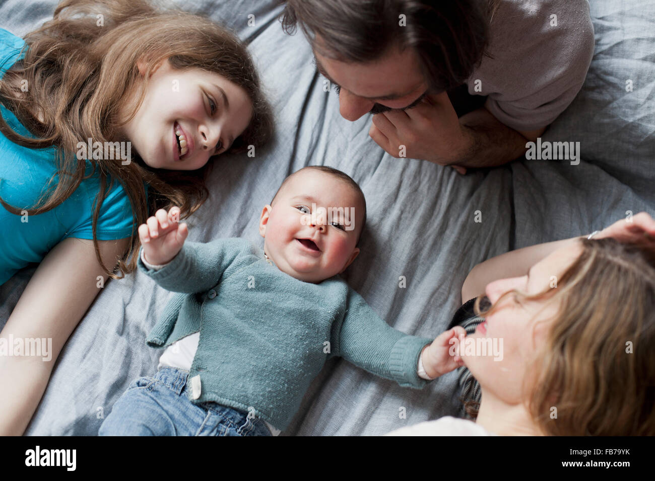 High angle view of family cute baby girl Banque D'Images