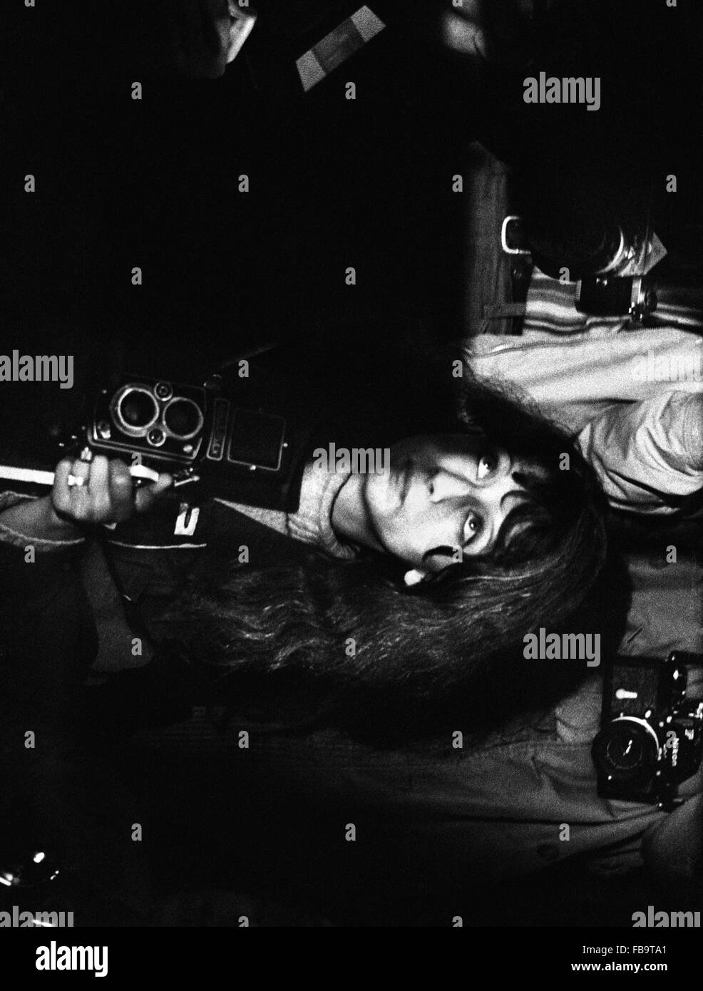 Les événements de 1968. - 1968 - France / Ile-de-France (région) - 1968 événements. - Un photographe lors d'un concert de musique dans la salle de concert de l'Olympia, Paris. 1968 - Philippe Gras / Le Pictorium Banque D'Images