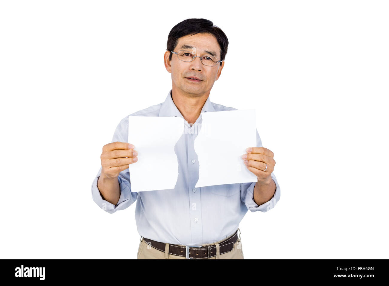 Older asian man showing a déchiré la page Banque D'Images