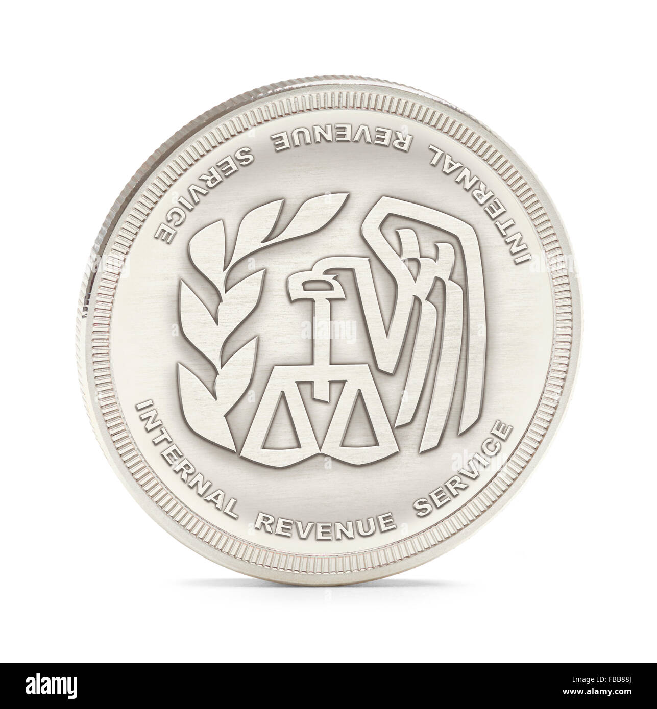 Internal Revenue Service Silver Coin isolé sur un fond blanc. Banque D'Images
