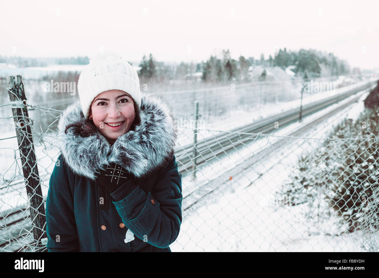 Beautiful Girl smiling in a white hat Banque D'Images