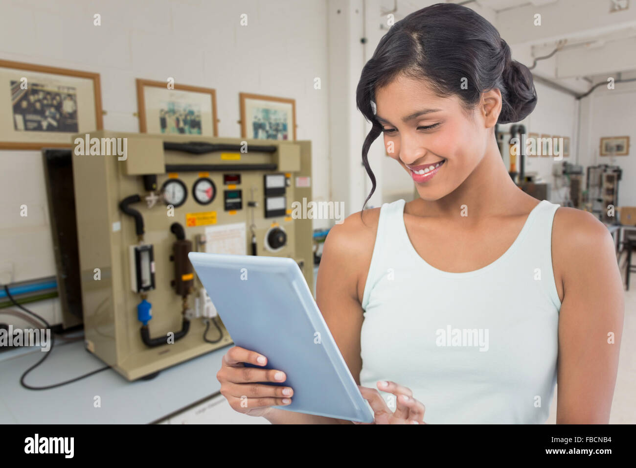 Portrait of businesswoman using digital tablet Banque D'Images
