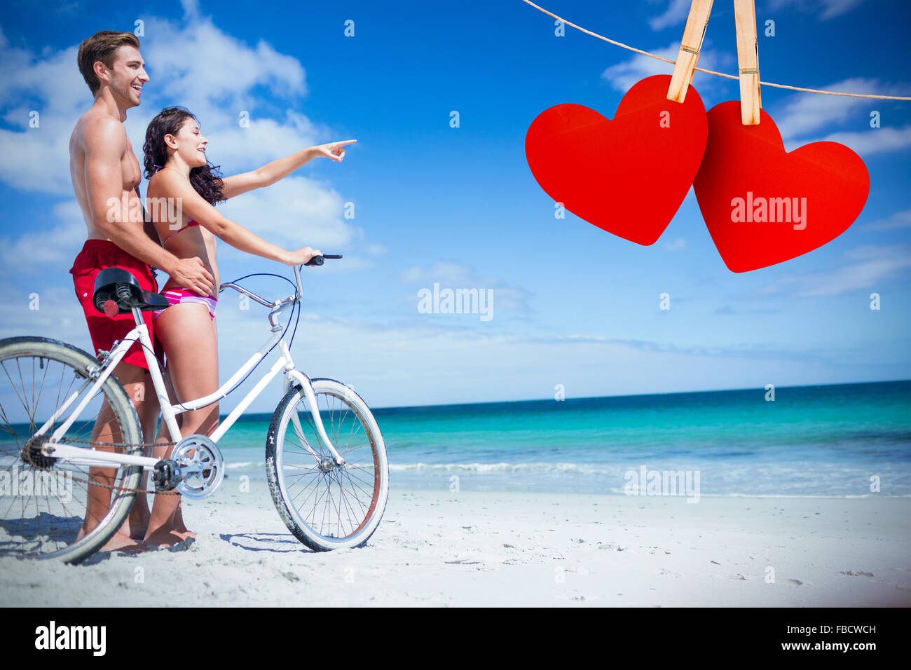 Image composite de l'heureux couple going on a bike ride Banque D'Images