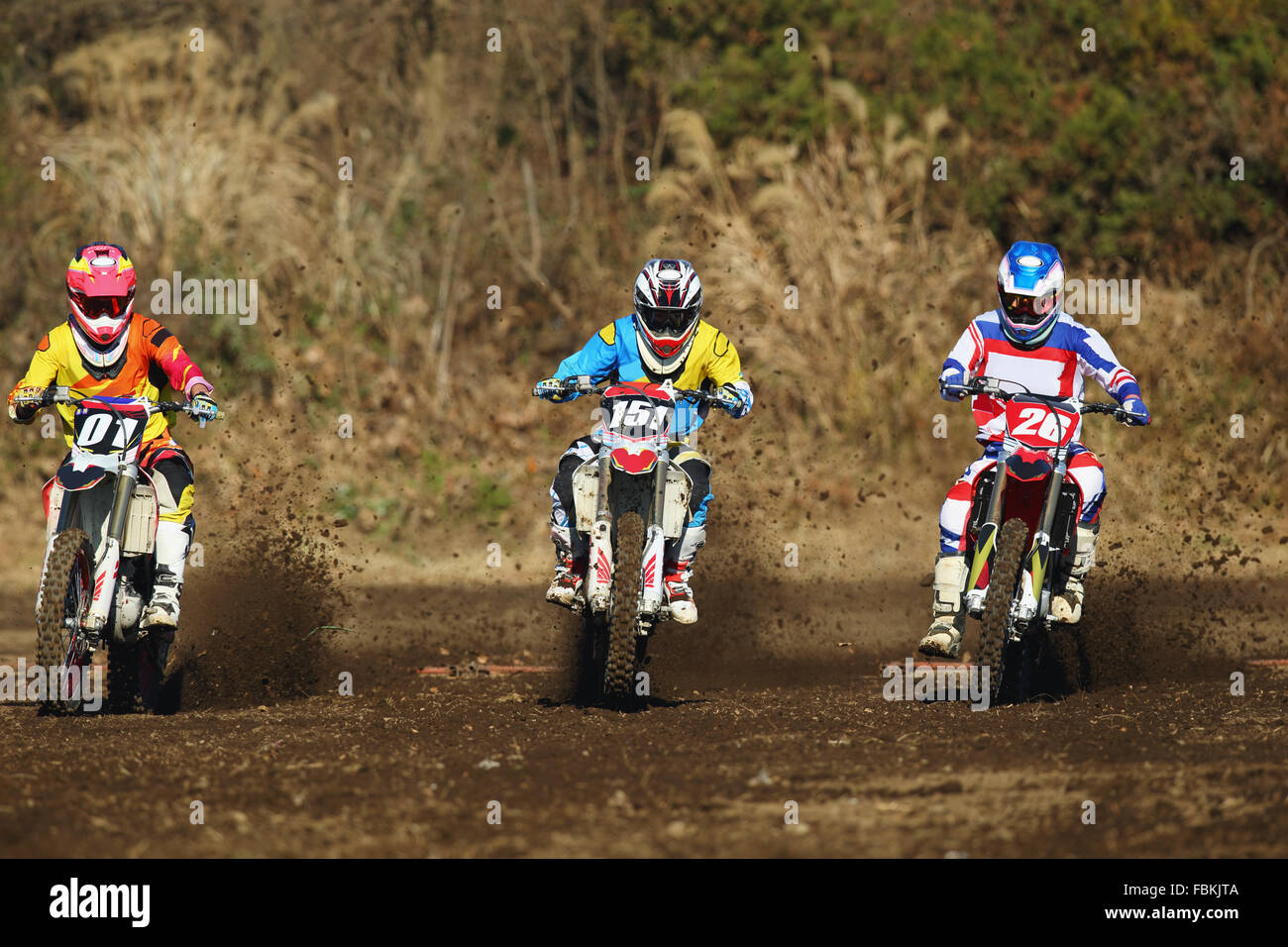 Les cyclistes sur piste de motocross Banque D'Images