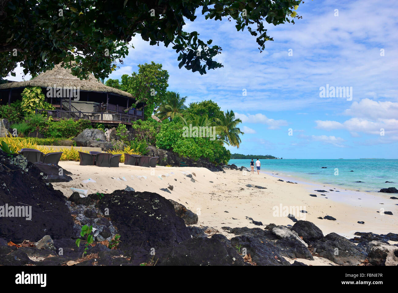 Vous pourrez vous détendre, flâner le long de la plage de sable de l'estran Pacific Resort Aitutaki, Îles Cook Aitutaki .du Pacifique Sud Banque D'Images