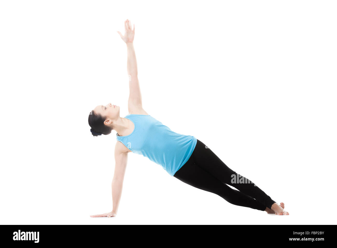 Yogi sportive girl doing exercises, planche, Vasisthasana, Yoga pose, isolé sur fond blanc Banque D'Images