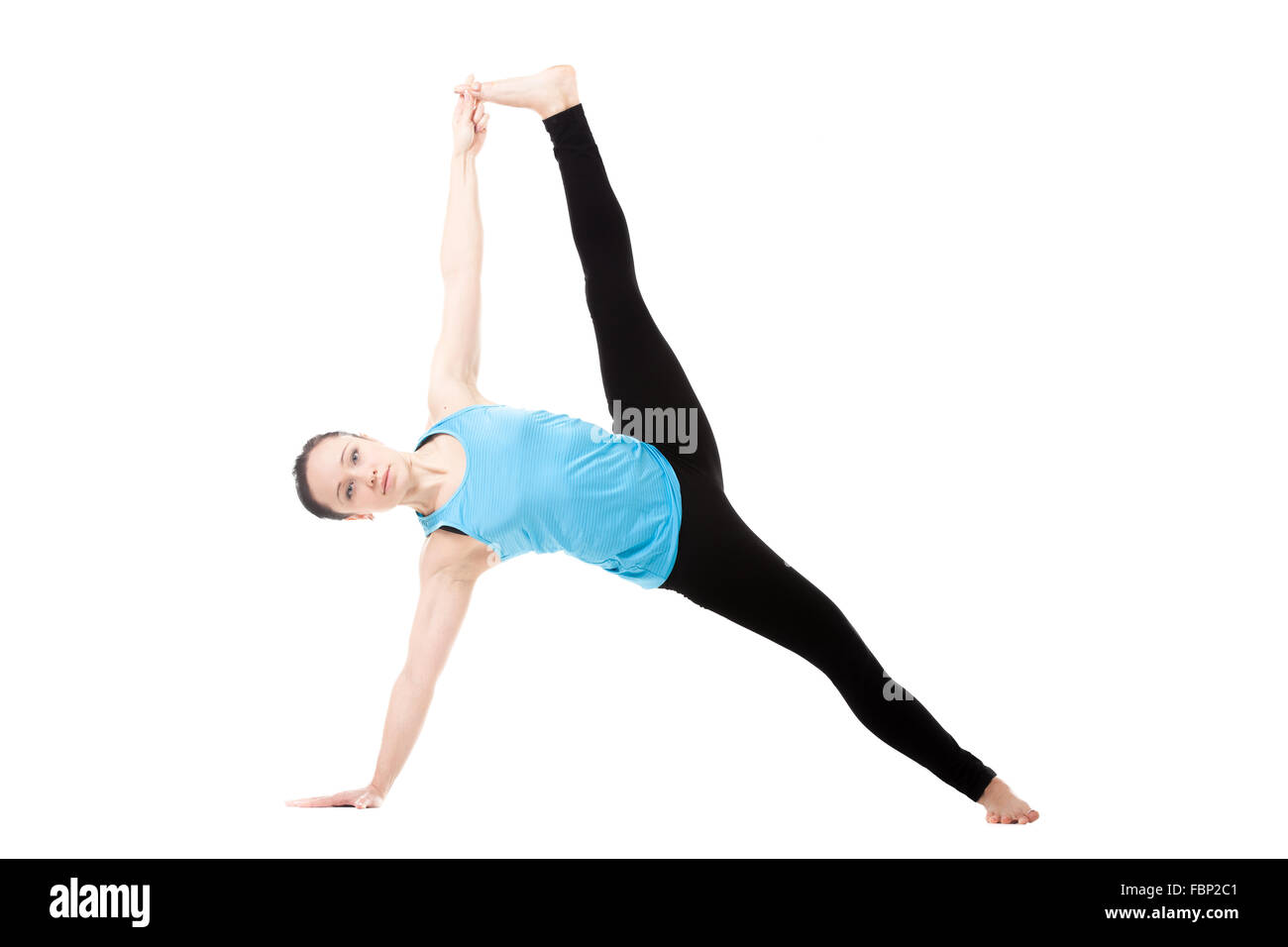 Yogi sportive girl doing exercises, version complète de planche, Côté Vasisthasana, Yoga, poser la patte supérieure perpendiculaire au plancher Banque D'Images