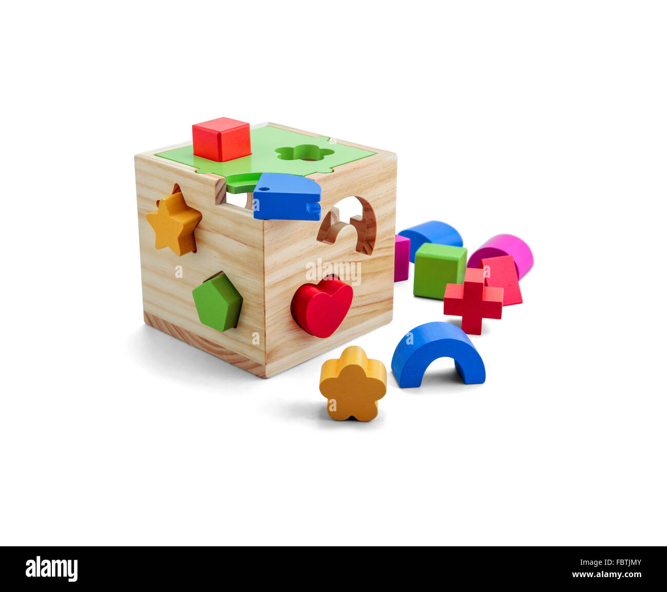 Puzzle en bois jouet avec blocs colorés isolated over white Banque D'Images