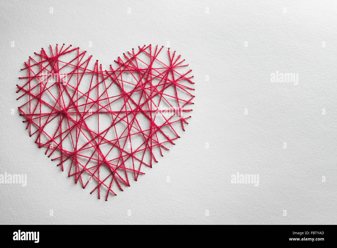 Coeur rouge faite de laine,Valentines Day concept. Banque D'Images