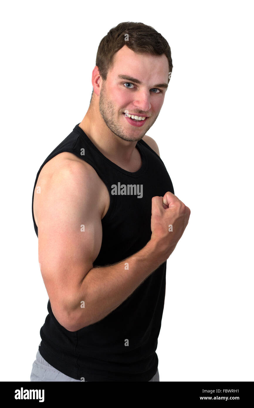 Young attractive man flexing biceps sa Banque D'Images