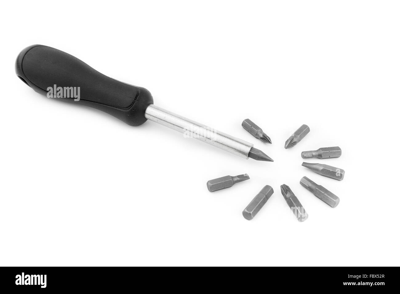 Close up et tournevis à tête interchangeable, isoler fond blanc Banque D'Images