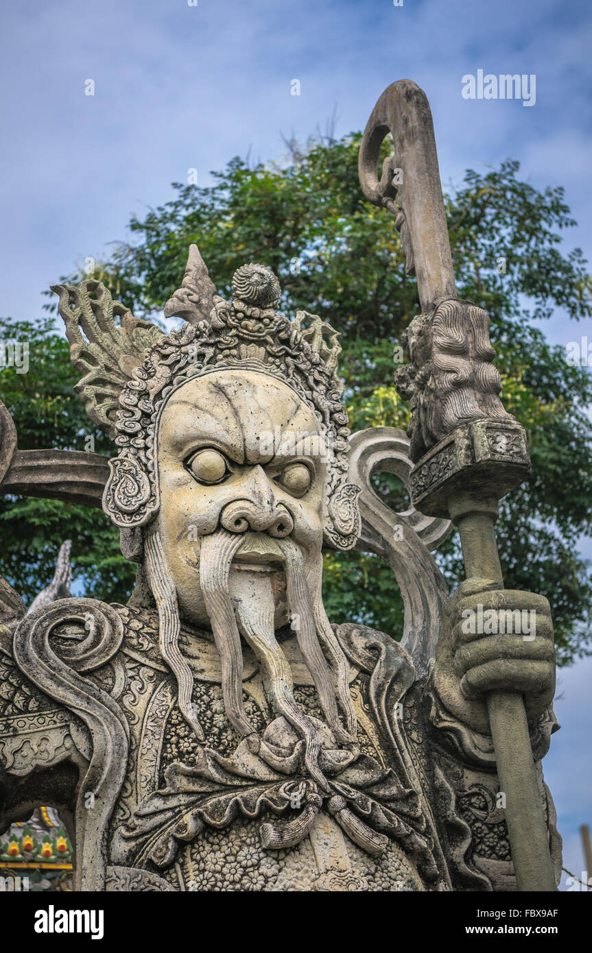 Statue de pierre chinois dans le Wat Pho, Bangkok, Thaïlande Chinese statue de pierre dans le Wat Pho, Bangkok, Thaïlande Banque D'Images
