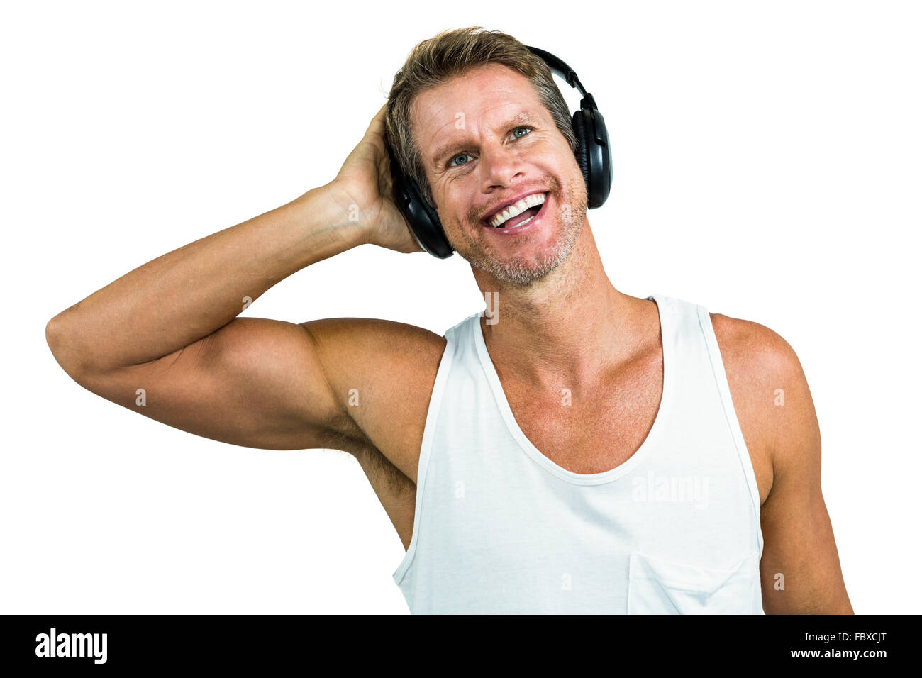 Smiling man entendre de la musique par le casque Banque D'Images