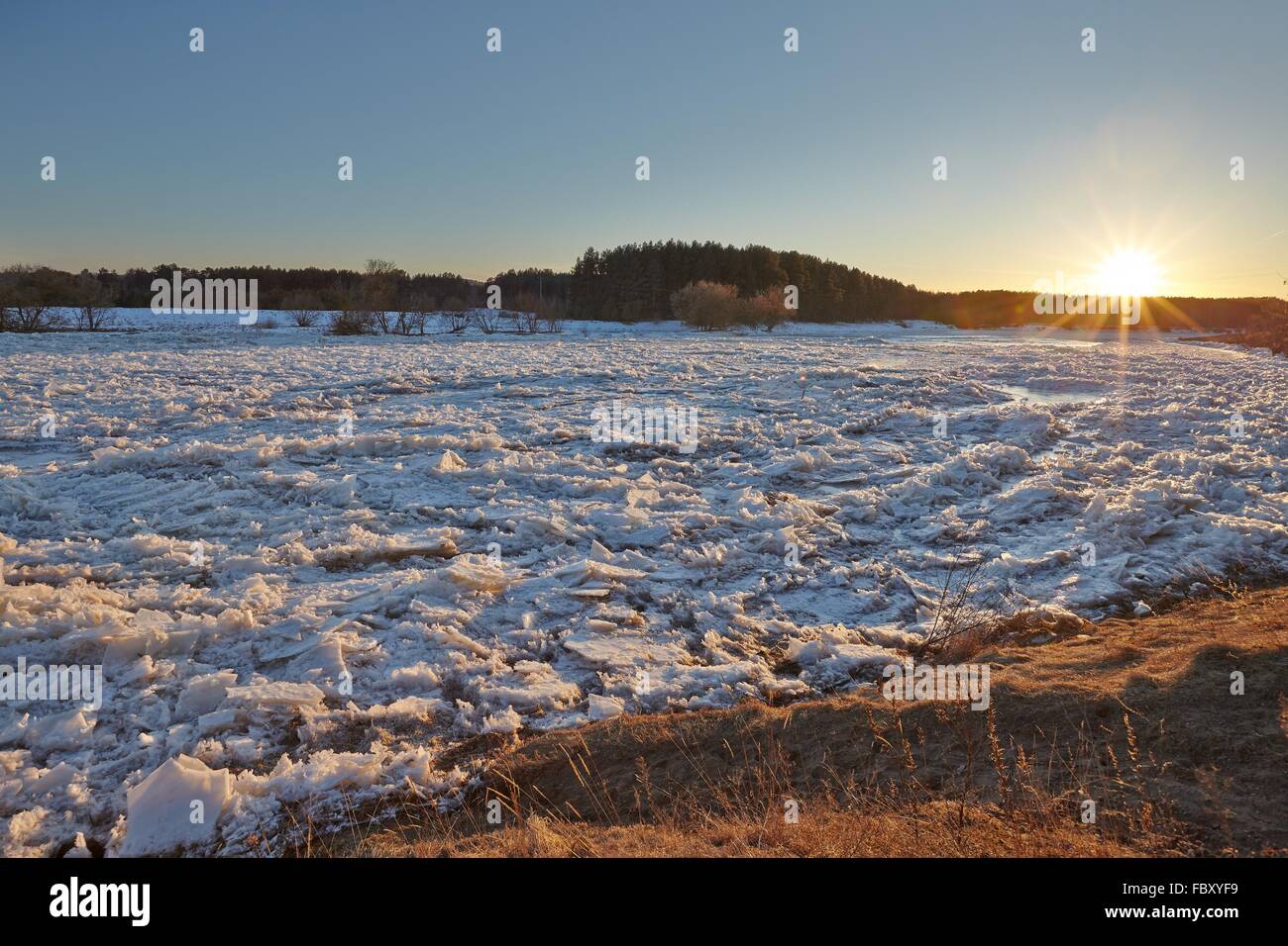 Frozen River Sunset Banque D'Images