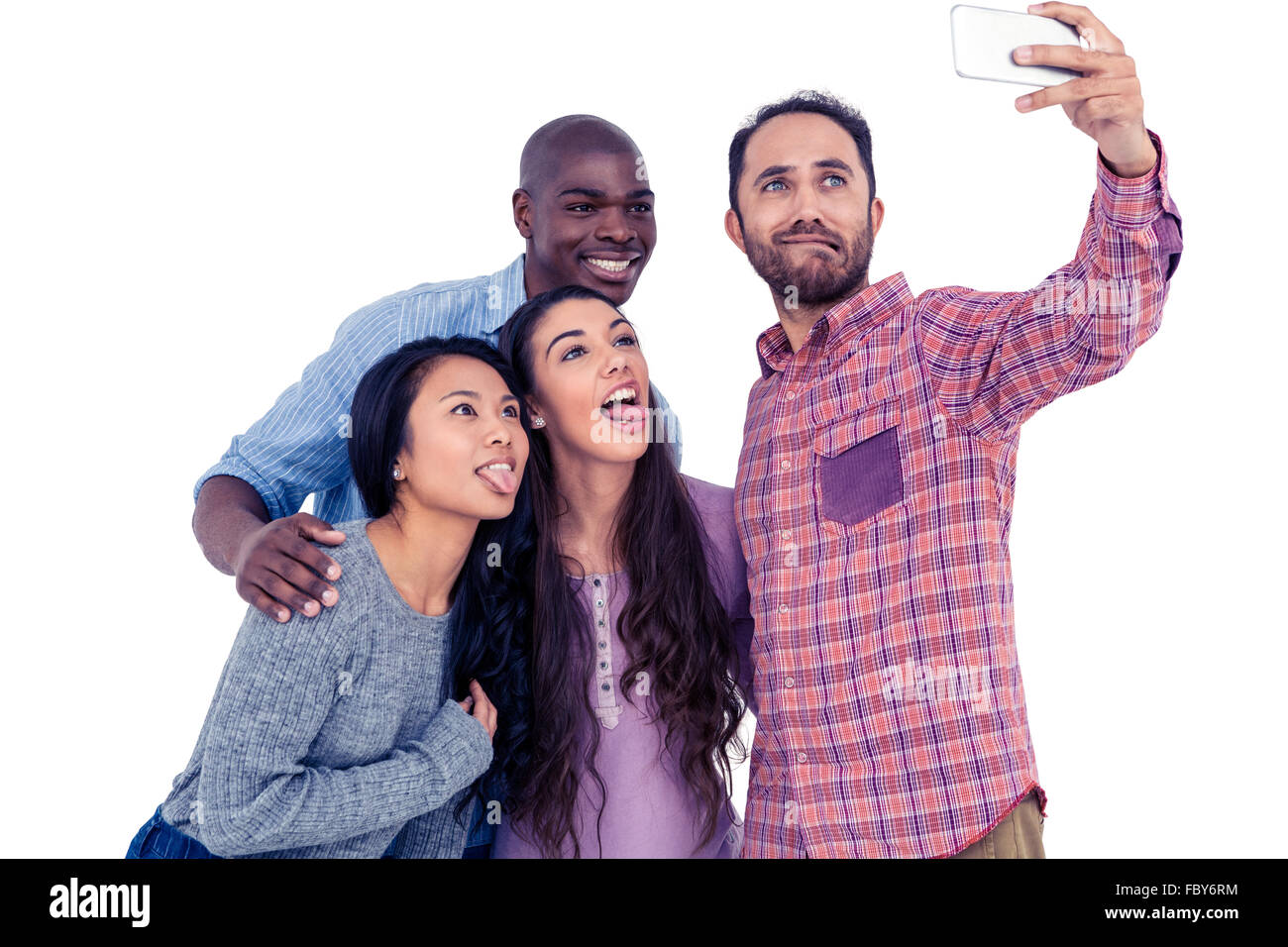 Multi-ethnic friends faire face tout en prenant des selfies Banque D'Images