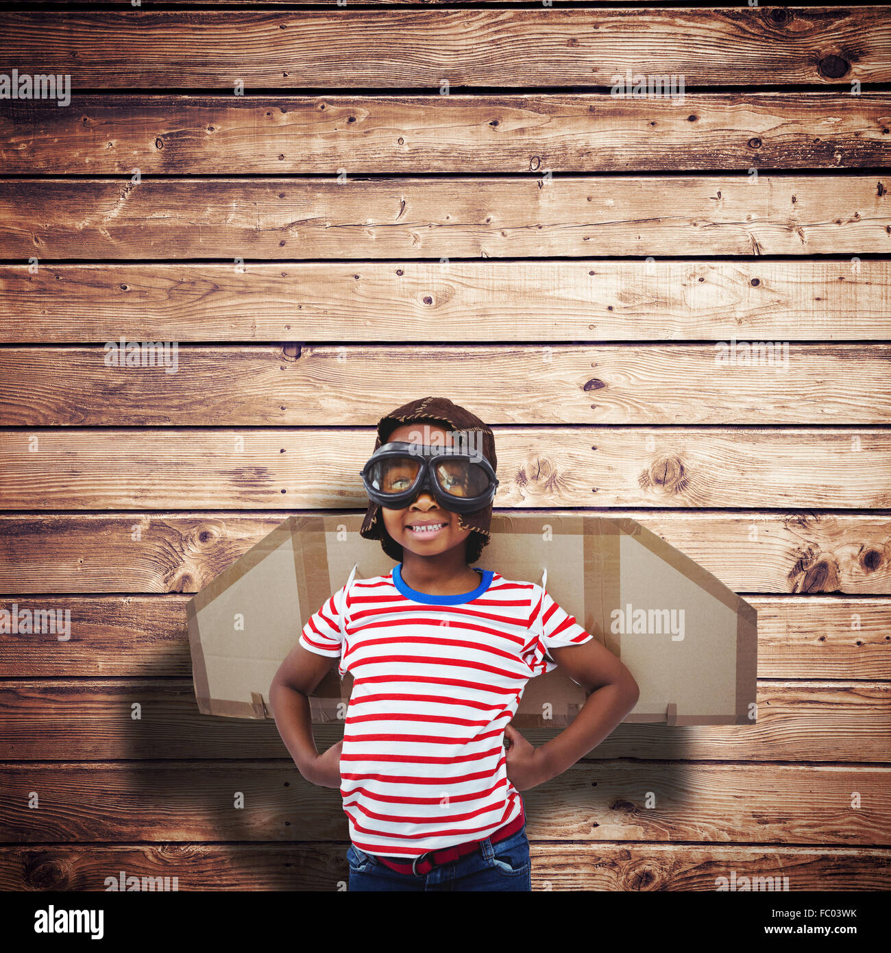 Portrait of boy prétendant être pilot Banque D'Images
