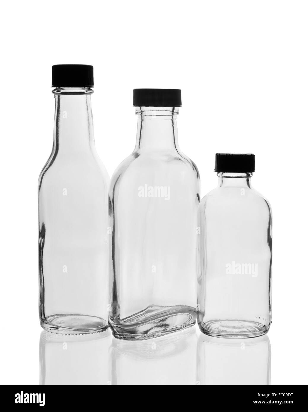 Trois bouteilles vides avec bouchon Banque D'Images