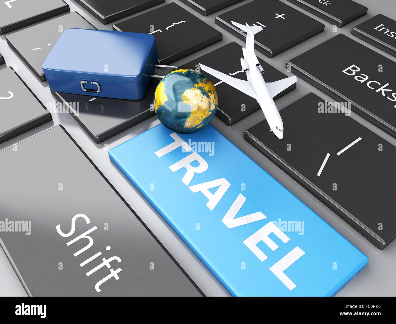 Valise, avion et de masse sur la clavier de l'ordinateur. Banque D'Images