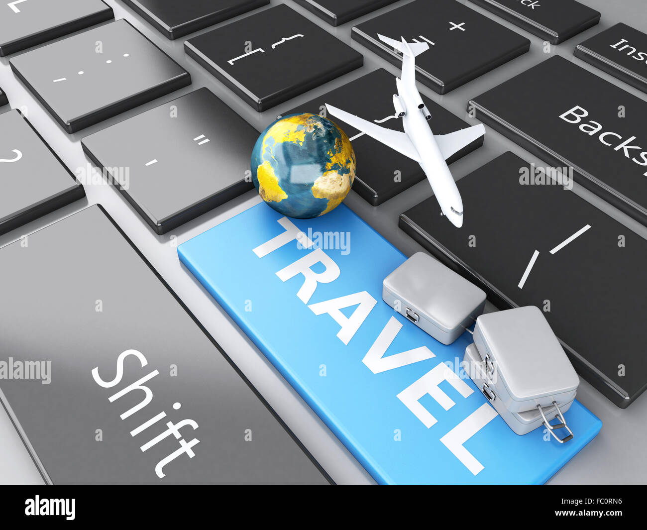 Valise, avion et de masse sur la clavier de l'ordinateur. Banque D'Images