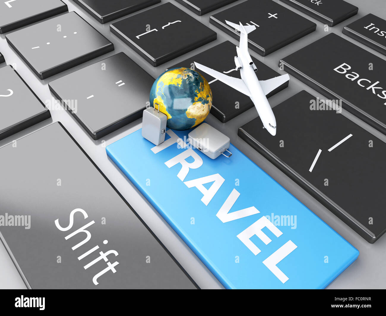 Valise, avion et de masse sur la clavier de l'ordinateur. Banque D'Images