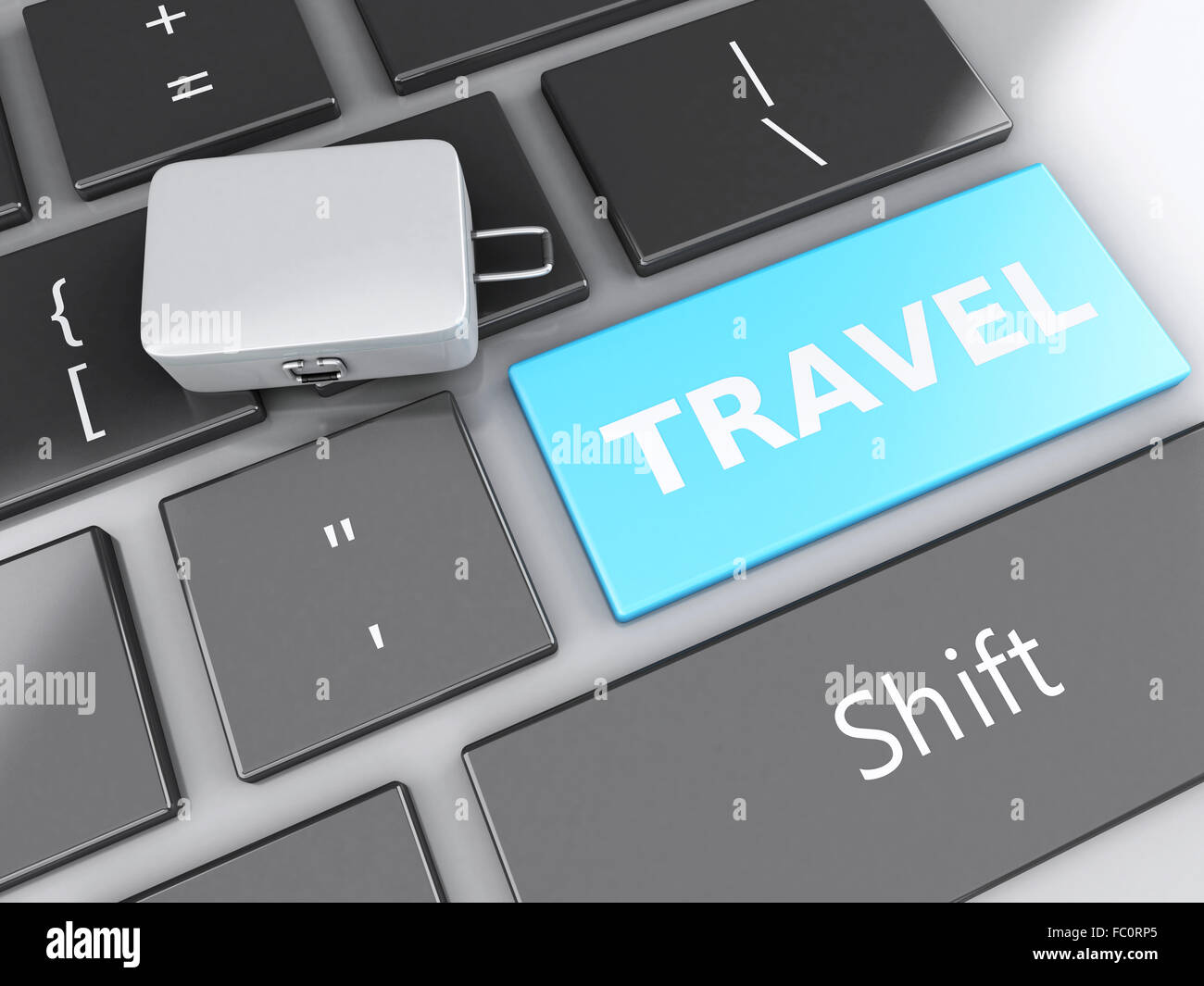 Valise de voyage sur le clavier de l'ordinateur. Billet d'hiver Banque D'Images