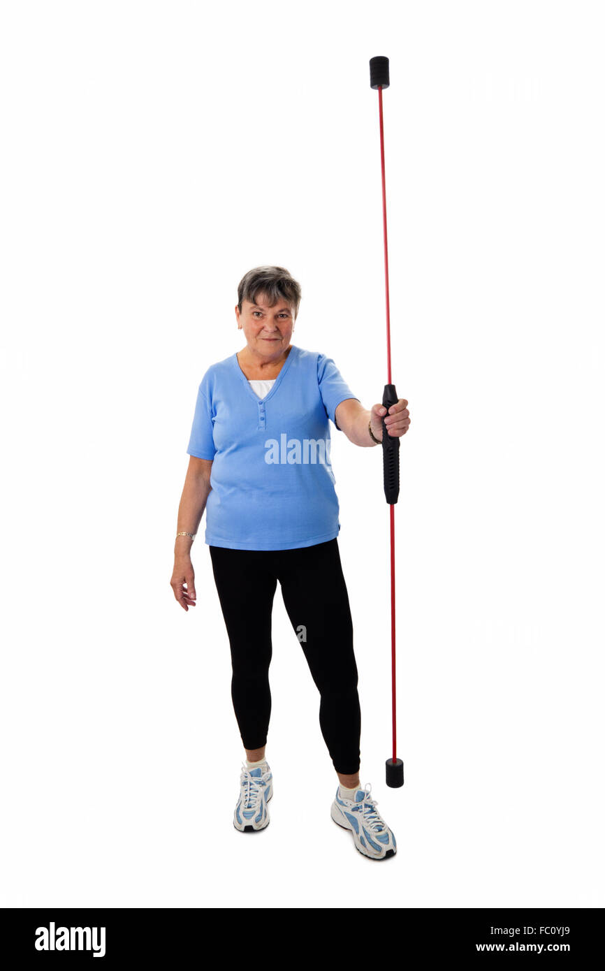 Senior woman with swing stick Banque D'Images