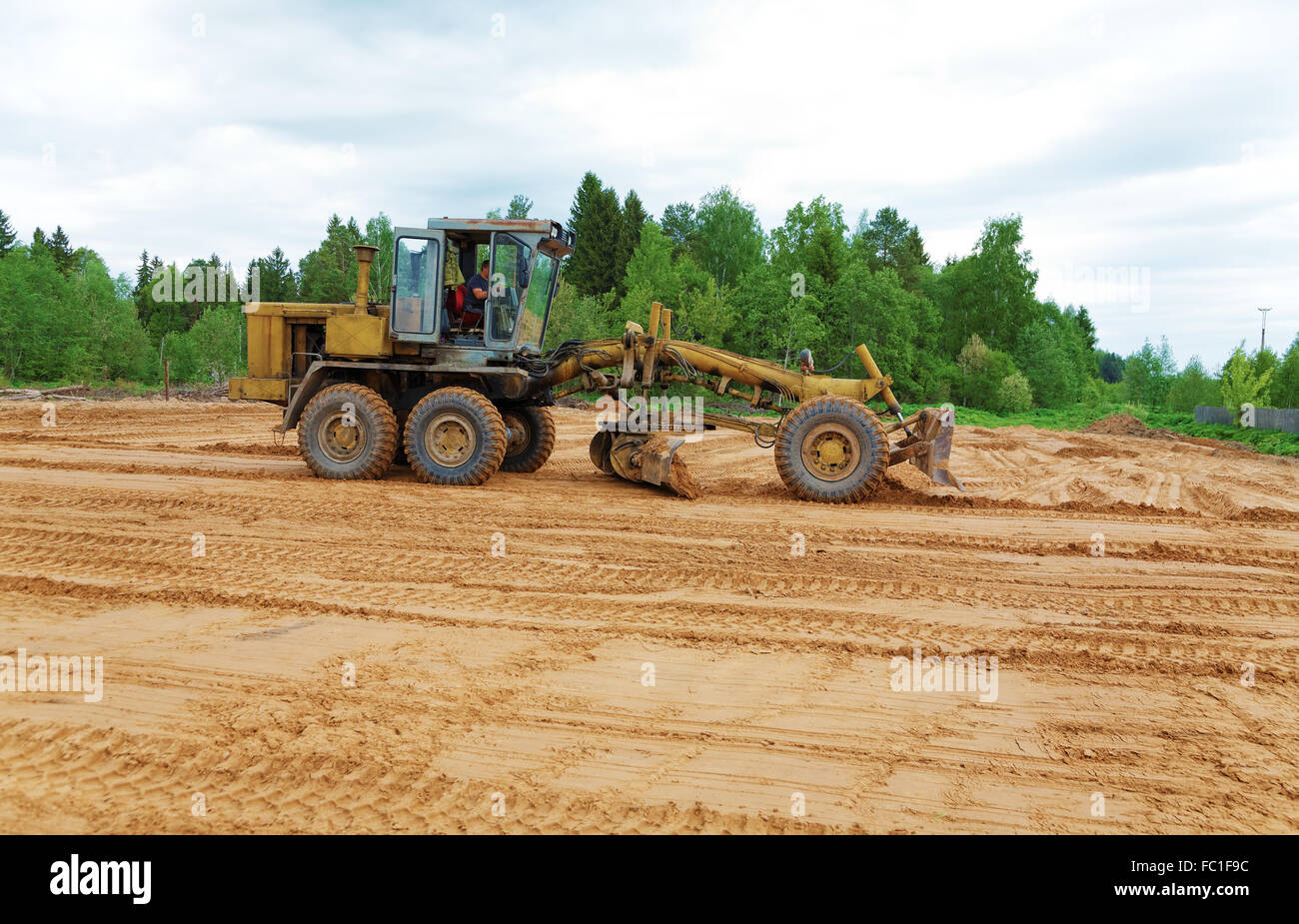 La niveleuse élimine un motif Banque D'Images