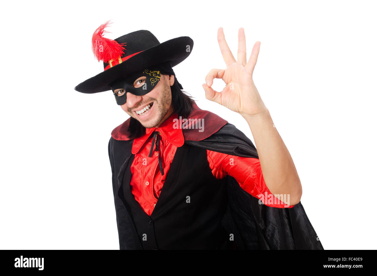 Jeune homme en manteau carnaval isolated on white Banque D'Images