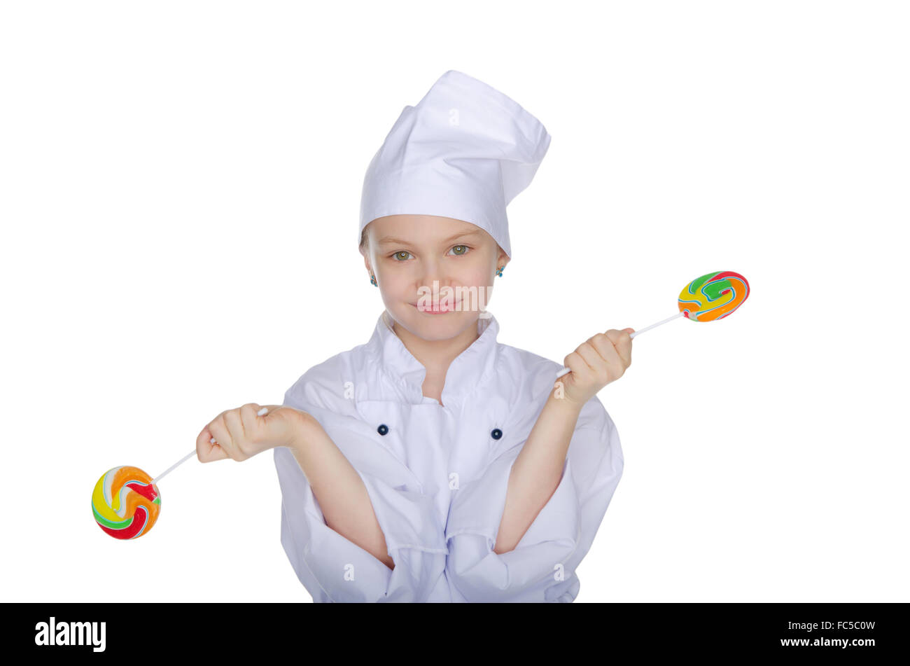 Jeune chef avec des bonbons colorés Banque D'Images