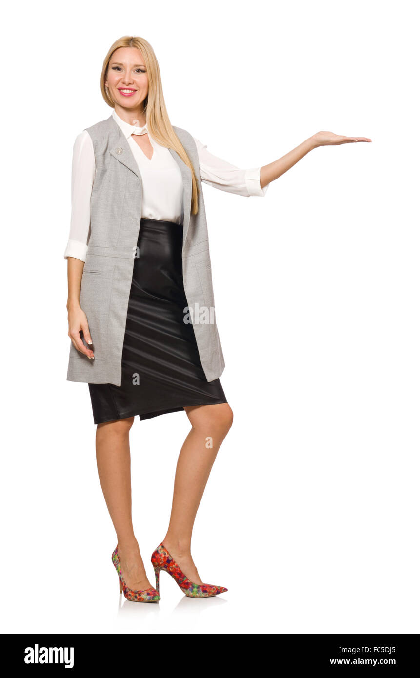 Jolie femme en jupe cuir isolated on white Banque D'Images