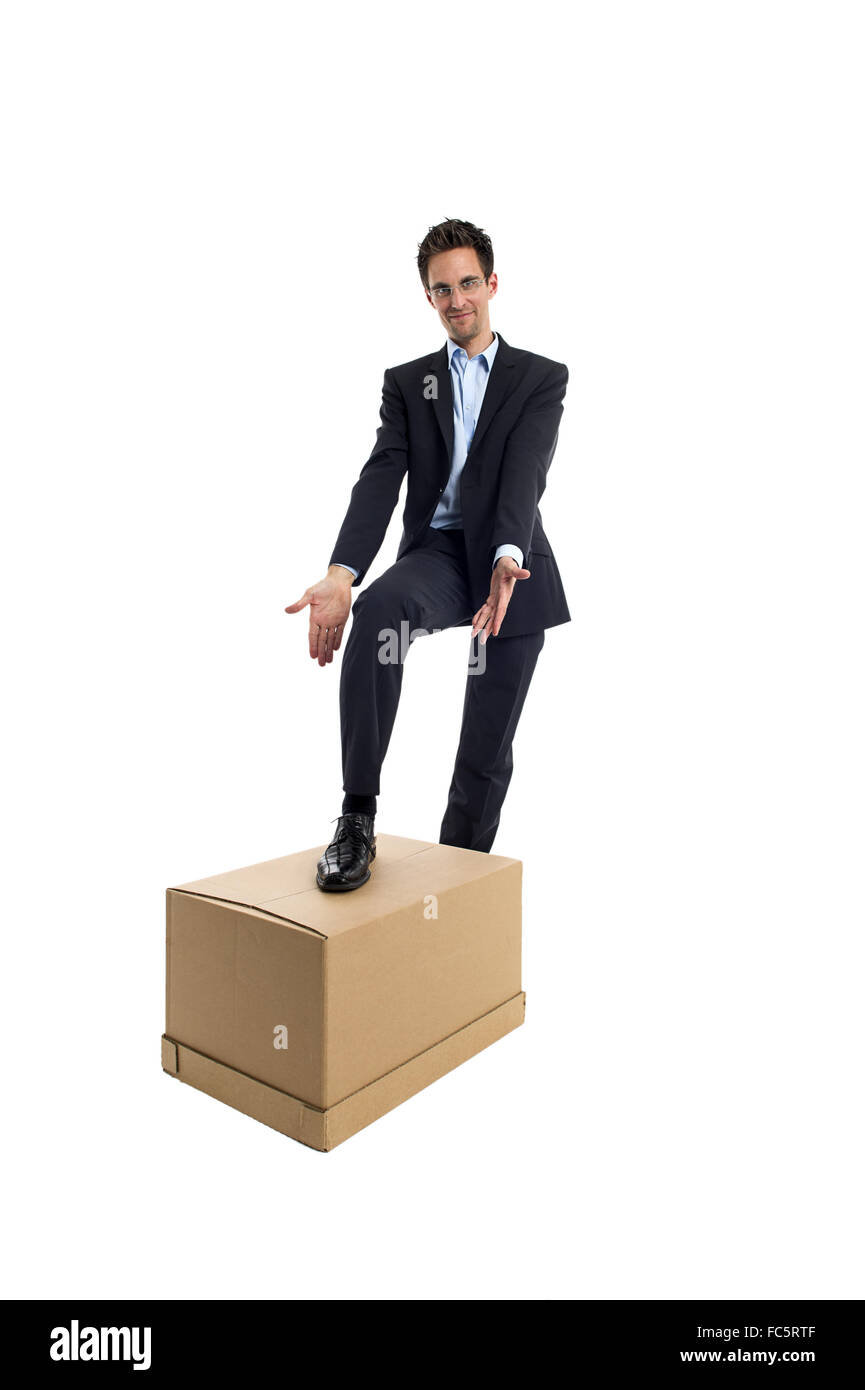 Businessman with a box Banque D'Images