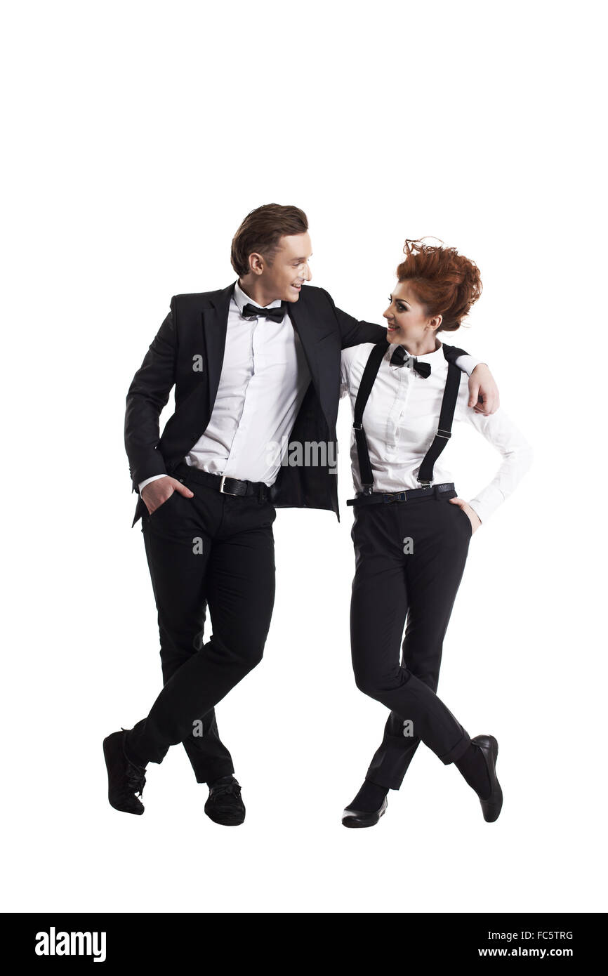 Beaux jeunes collègues posing in embrace Banque D'Images