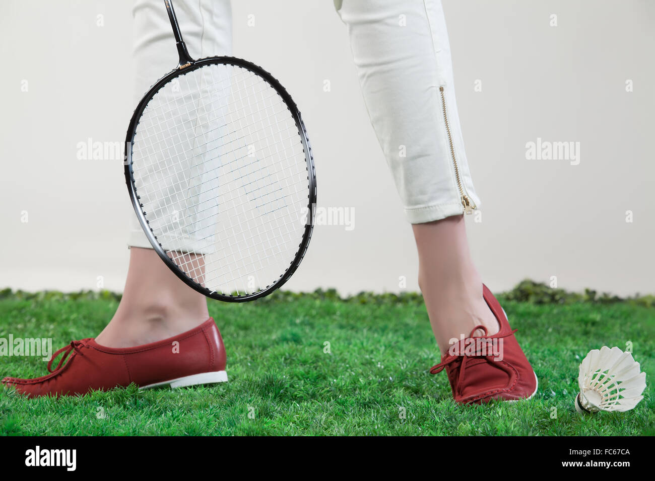 Les jambes de la femme et de raquette de Badminton Photo Stock - Alamy