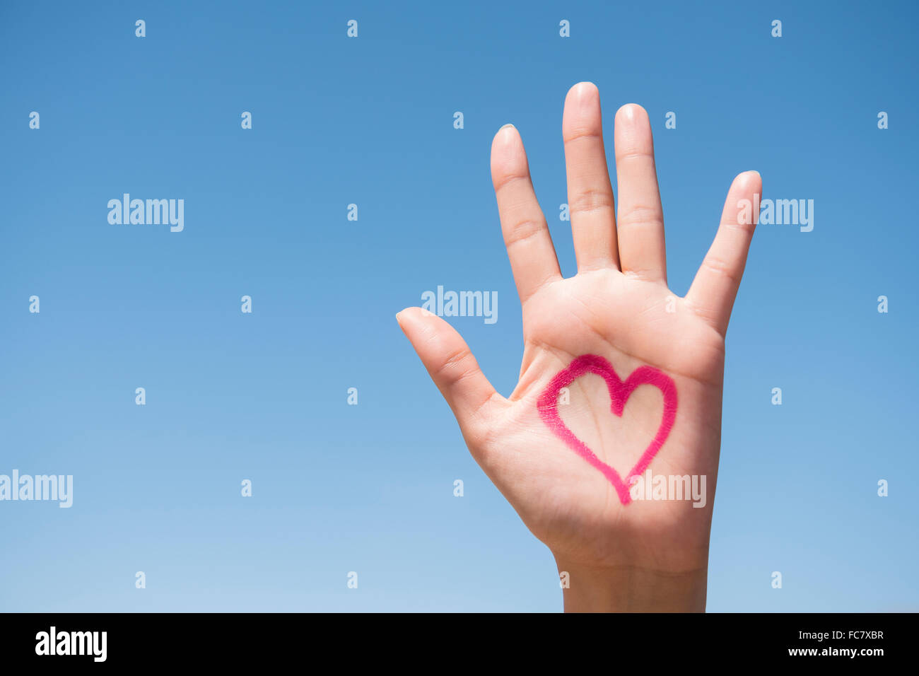 Hispanic woman with hand Banque D'Images