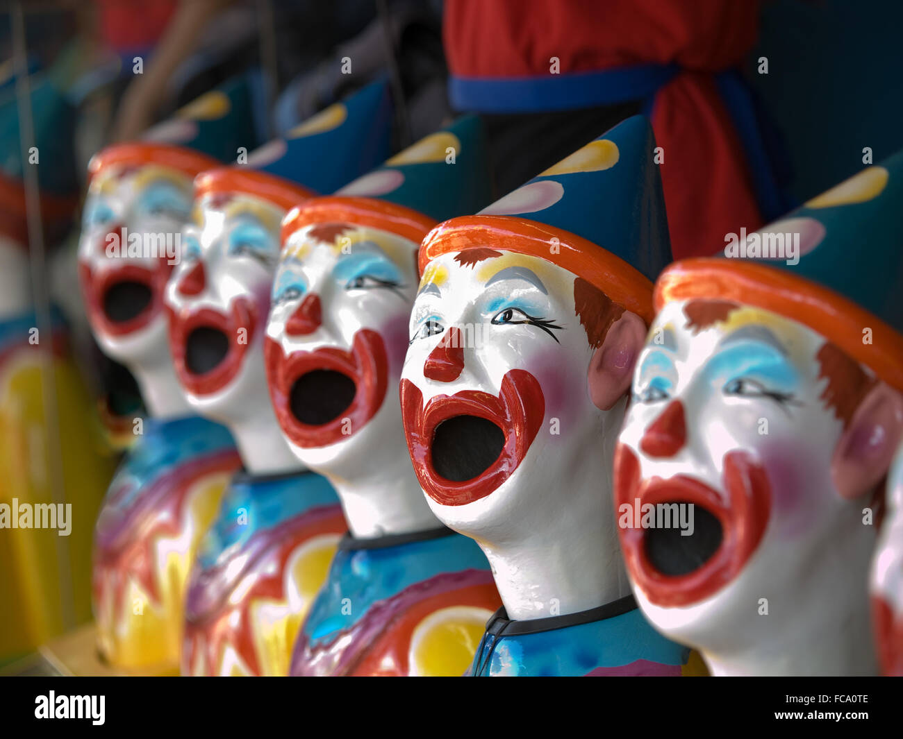 Ligne de tête de clown en céramique avec la bouche ouverte à un jeu à l'Exposition nationale canadienne, Toronto, Ontario, Canada. Banque D'Images