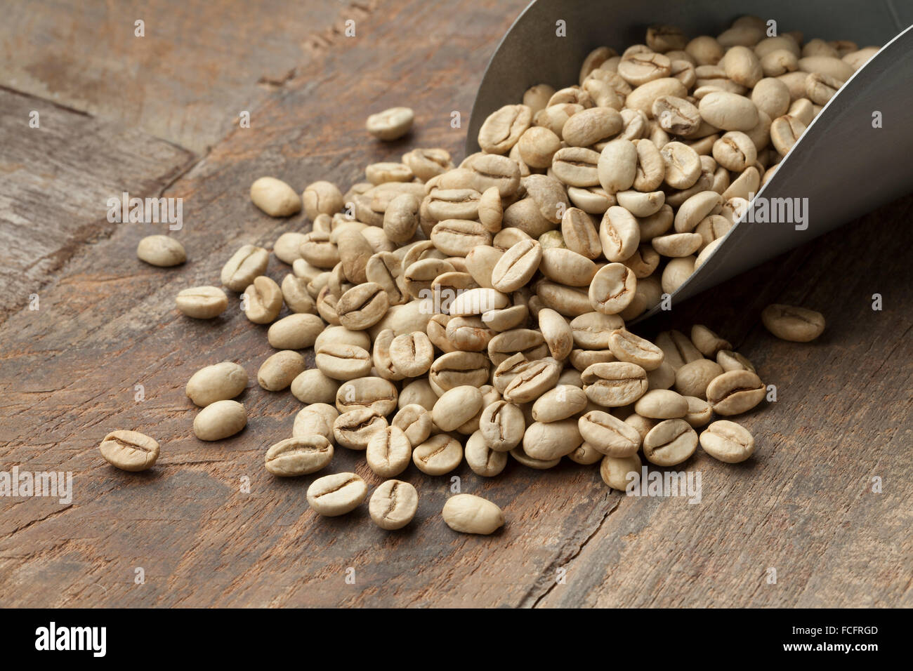 Tas de Malabar indiennes les grains de café non torréfié vert Banque D'Images