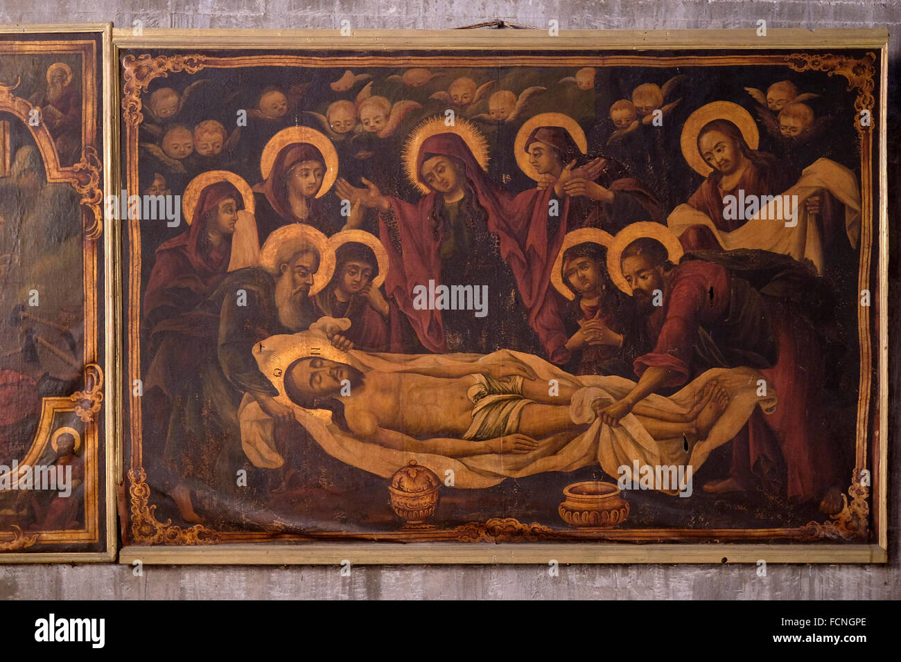 Peinture représentant le corps de Jésus-Christ préparé pour l'enterrement après Crucifixion pendu à l'intérieur de la Chapelle orthodoxe grecque Katholikon ou Catholicon dans l'Église du Saint-Sépulcre, dans la vieille ville de Jérusalem Israël Banque D'Images